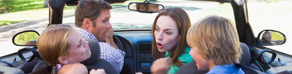 family in a convertible car